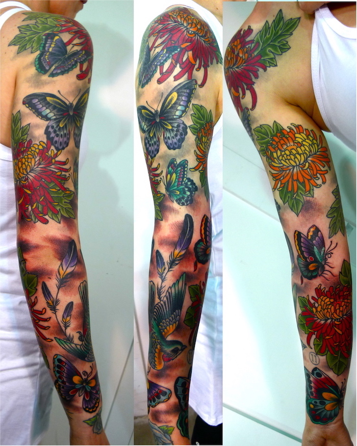 coloured floral tattoo, butterflies and birds, white top, sleeve tattoos for girls