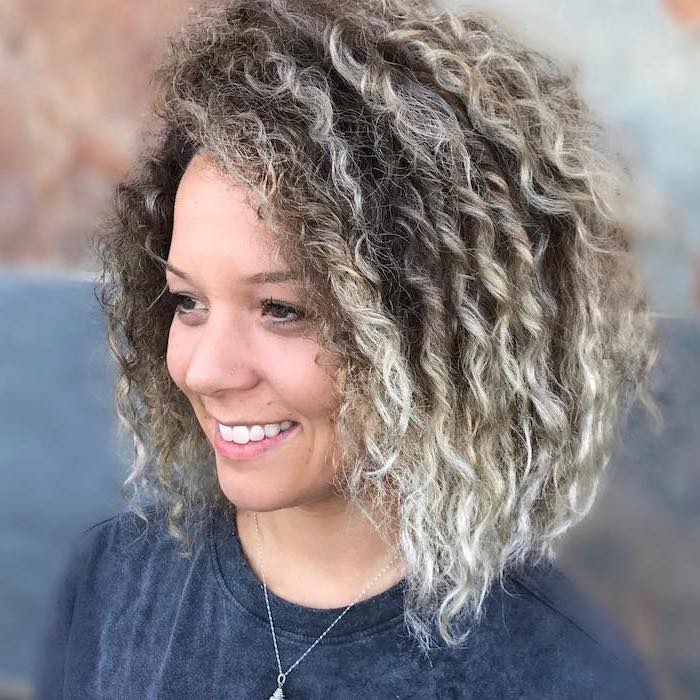 very curly, brown to blonde, short hair, grey shirt, how to ombre hair