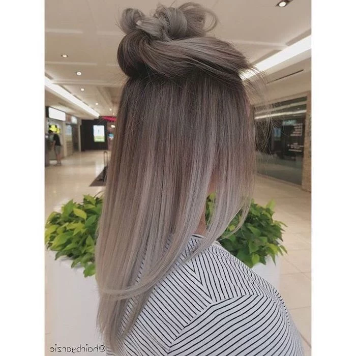 dark blonde to ash grey, long straight hair, in a bun, how to ombre hair, black and white striped blouse