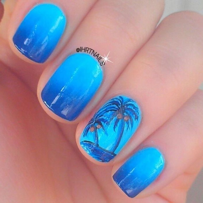 light and dark blue ombre, blue palm trees, manicure ideas, short nails