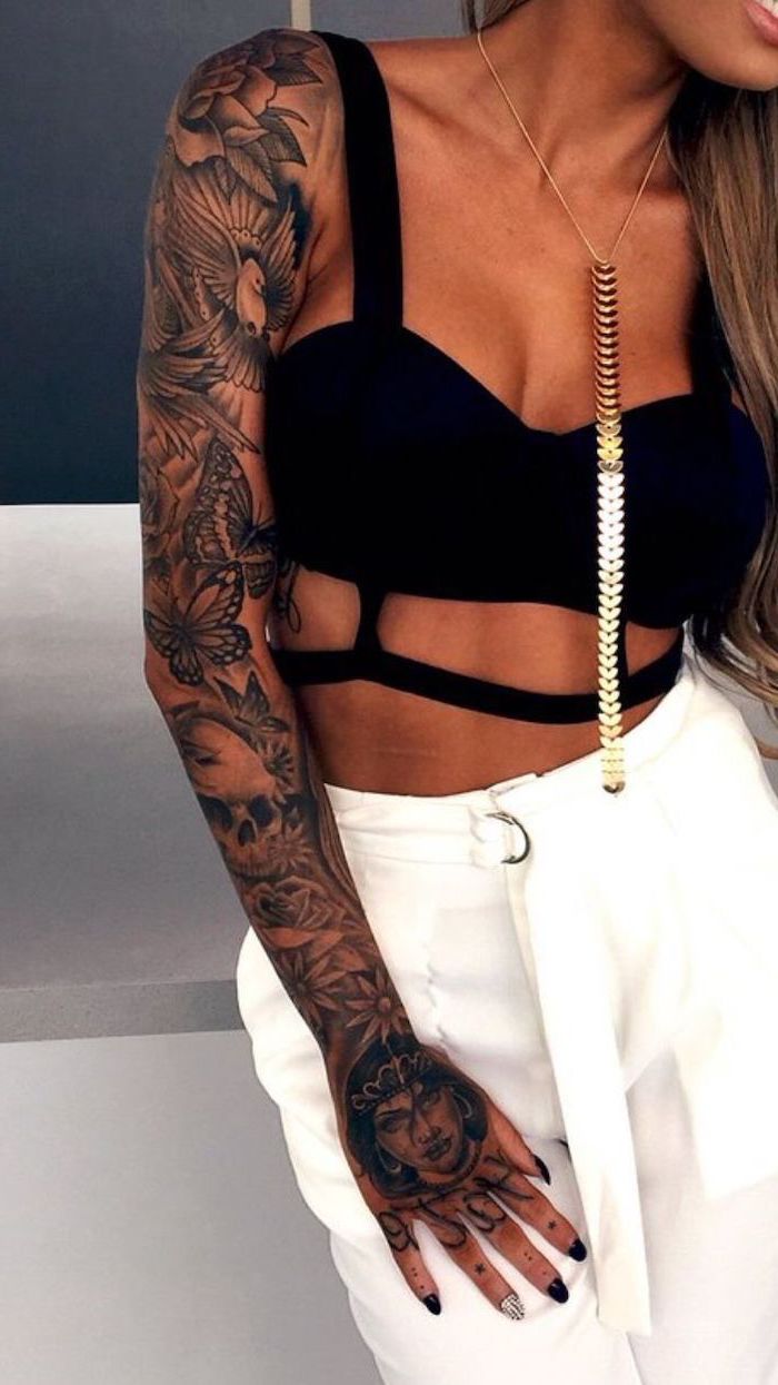black top, white pants, flowers and butterflies, tattoo sleeve ideas for men, golden necklace