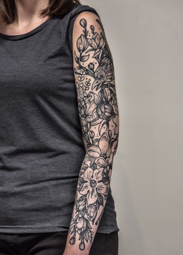 grey top, white background, floral tattoo, sleeve tattoos for girls