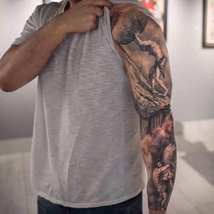 dragon sleeve tattoo, grey top, religious theme, man pushing a stone, up a mountain