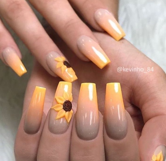 nail tip designs, nude and yellow ombre, long coffin nails, 3d sunflowers