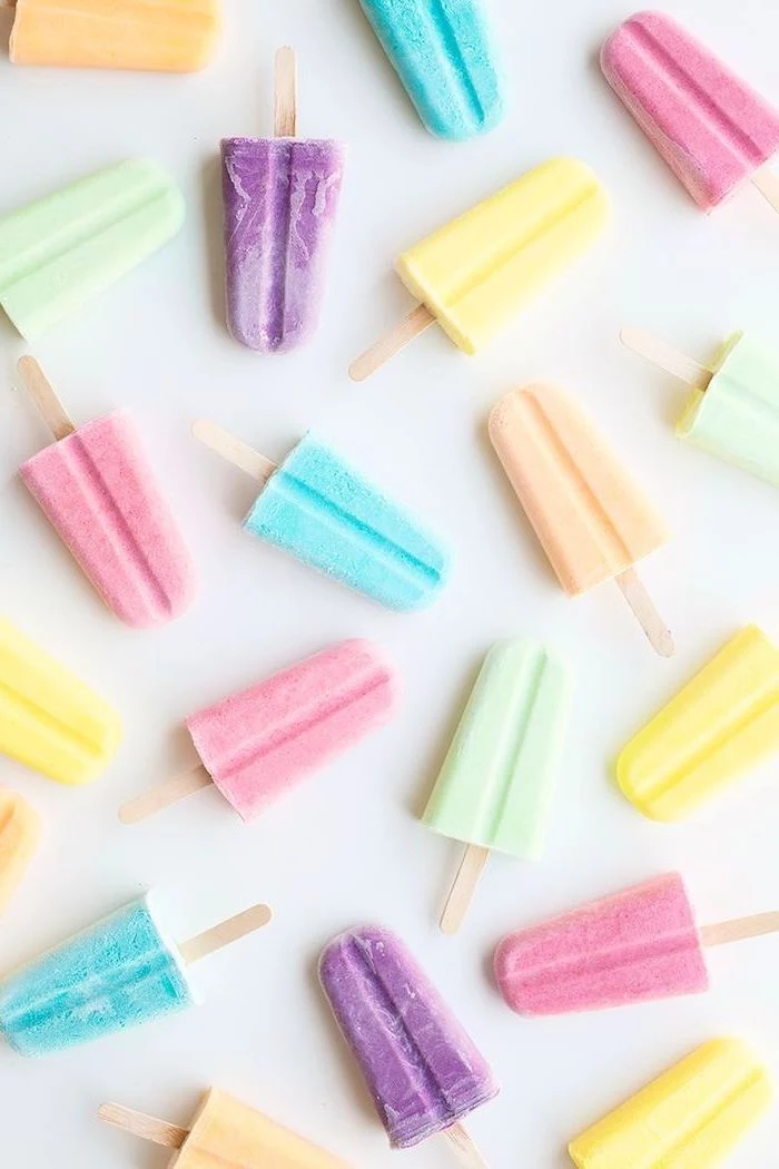 colorful lollies, aesthetic iphone wallpaper, yellow and orange, purple and blue, pink and green