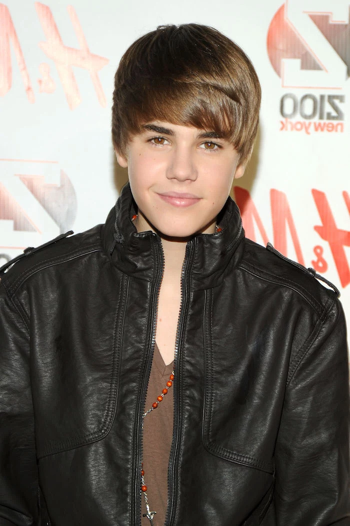 justin bieber, iconic haircut, side sweep, black leather jacket, brown t shirt, cool haircuts for boys