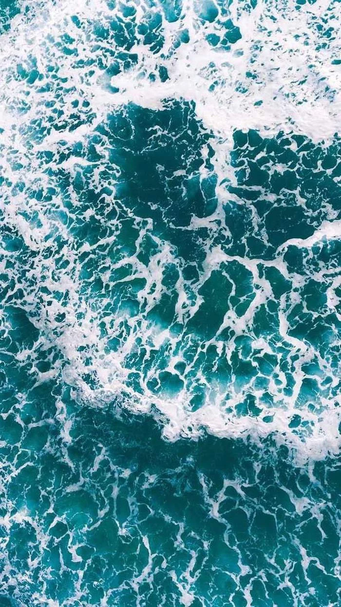 ocean waves, clashing in the middle, aesthetic iphone wallpaper, blue water