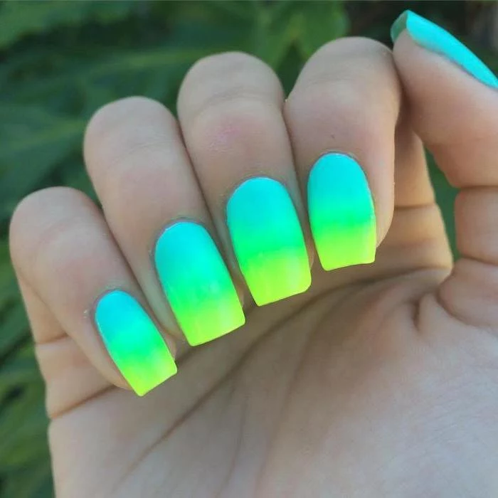 blue green and yellow, neon nail polish, ombre effect, coffin nail ideas, blurred background