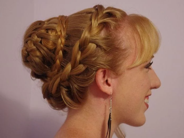 blonde hair, intricate braided updo, natural hairstyles braids, pink background