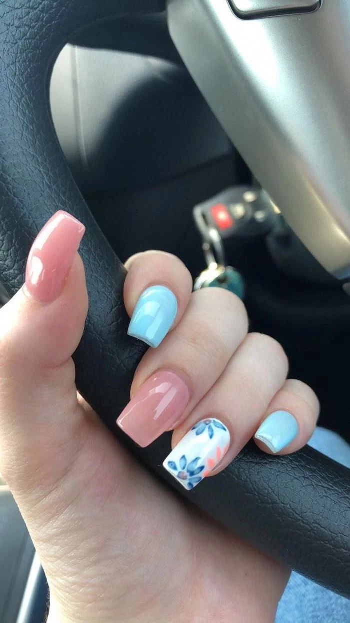 pink and blue nail polish, blue and pink flowers, nail design ideas, steering wheel