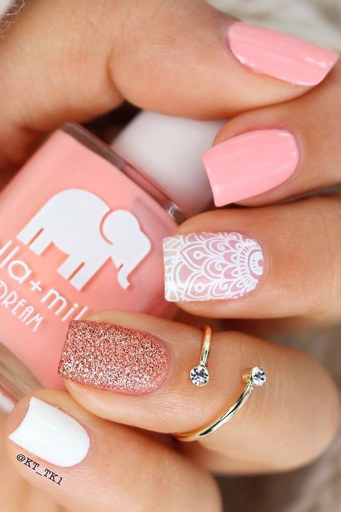 pink white and glitter nail polish, gold ring, nail design ideas, nail polish bottle