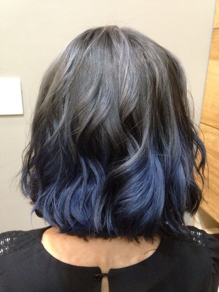 ombre hairstyles, ash grey to dark blue, short wavy bob hairstyle, black top, white background