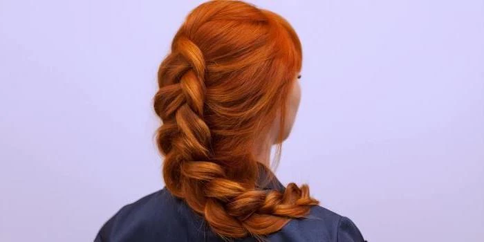 red hair, large braid, purple background, easy braid hairstyles, blue shirt