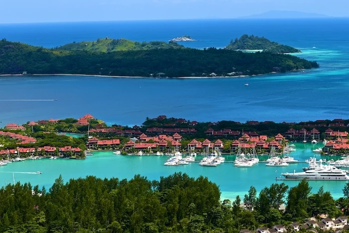 seychelles islands, houses and villas, yachts and boats, on the marina, turquoise water