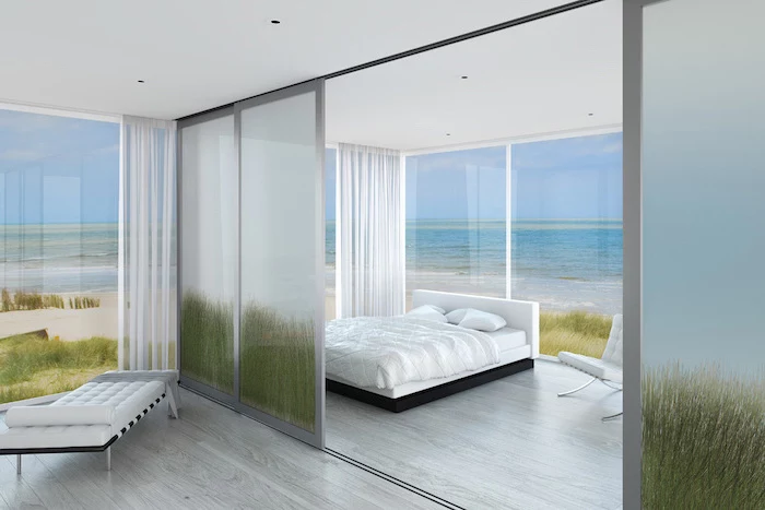frosted glass, sliding panels, bedroom bed, room divider bookcase, white curtains, white lounge chair