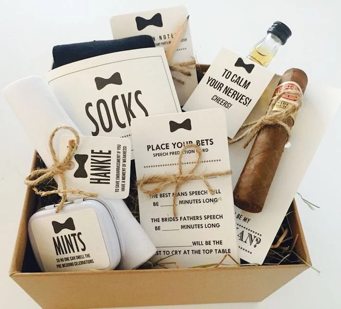 carton box, with socks and mints, handkerchief and pencil, cigar and alcohol, groomsmen watches