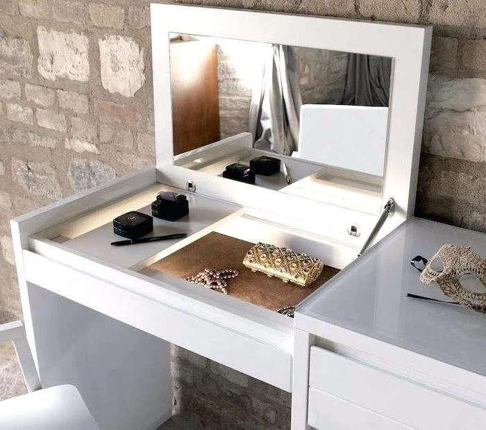 corner makeup vanity, white table, pull out mirror, white chair, stone wall