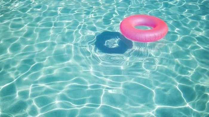 blue pool water, pink pool float, rose gold iphone wallpaper