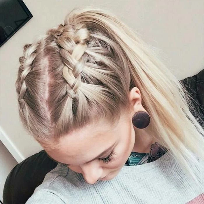 blonde hair, two braids in a ponytail, grey sweatshirt, braid styles for girls, white background