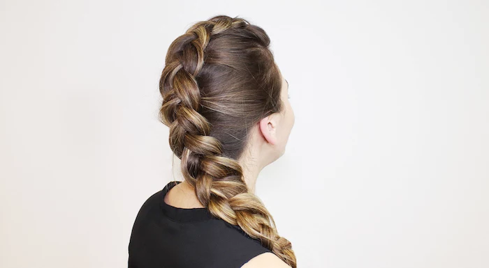 how to do a waterfall braid, brown hair, blonde highlights, black top, white background