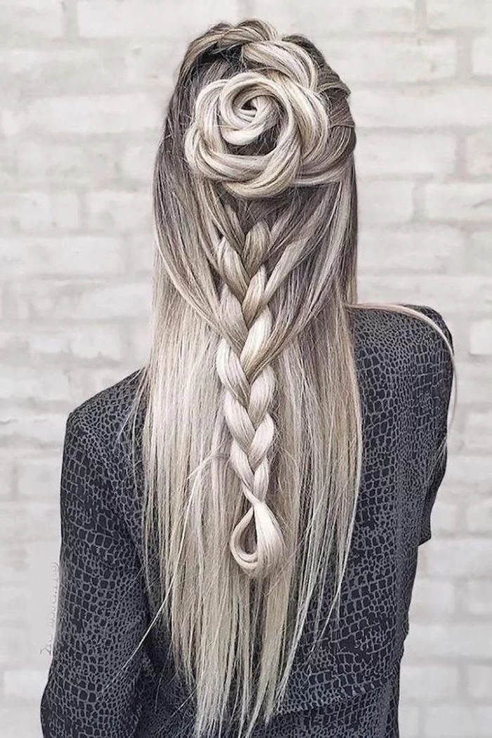 ash grey hair, blonde highlights, braid and a rose shaped bun, how to do a waterfall braid, white brick wall