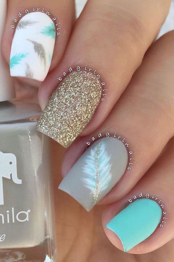 blue white and grey, matte nail polish, gold glitter, blue and gold feathers, classy nail designs