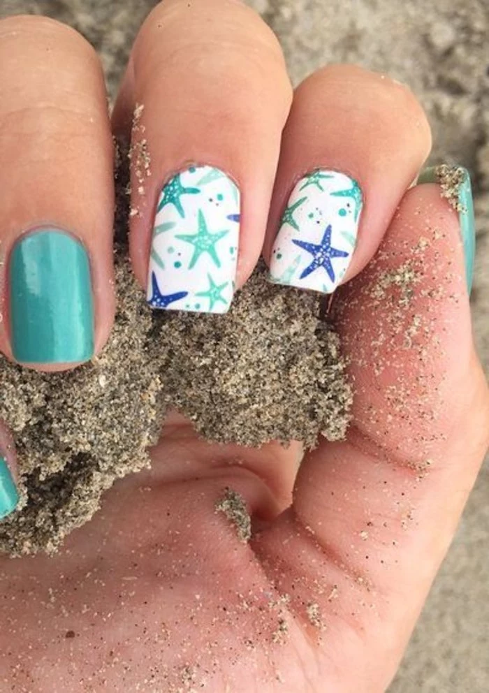 blue and white nail polish, blue and turquoise, sea stars drawings, classy nail designs, beach sand