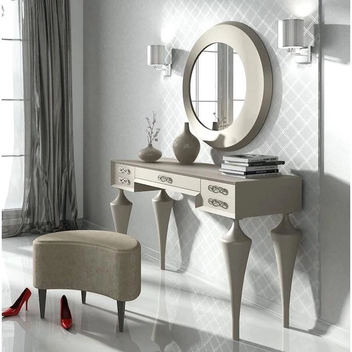 wooden table, round mirror, makeup vanity table with lighted mirror, beige ottoman, white floor