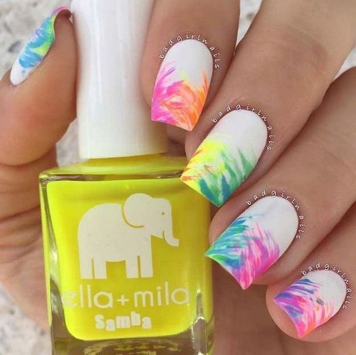 white nail polish, rainbow colored brush strokes, cute gel nails, nail polish bottle