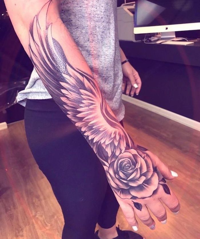 angel wings tattoo arm