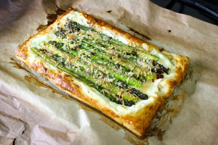 asparagus inside a pastry, brunch recipes, baking sheet, cheese on top