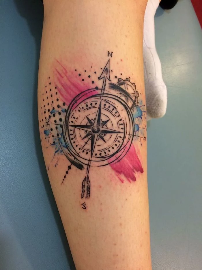 watercolor tattoo, leg tattoo, compass tattoo, white leather bed