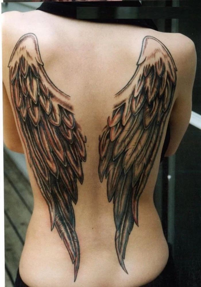 heaven tattoos, angel wings, back tattoo, blurred background