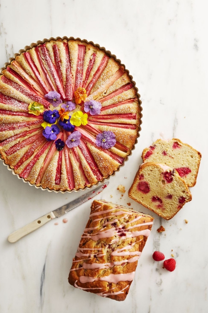 breakfast recipes, raspberry cake, marble countertop, purple and yellow flowers on top