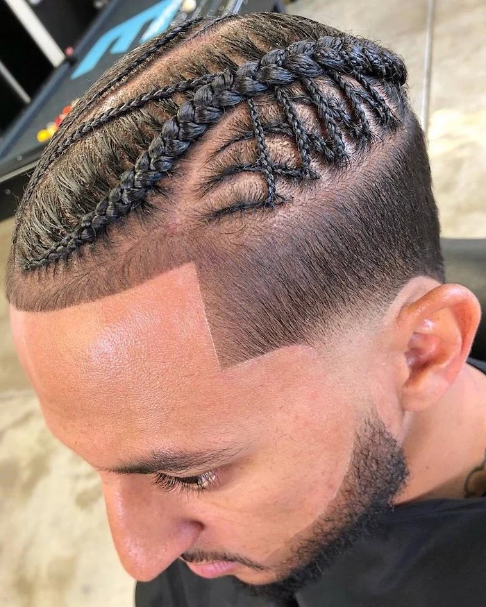 man with black hair, fade undercut, braided hairstyles for men, tiled floor