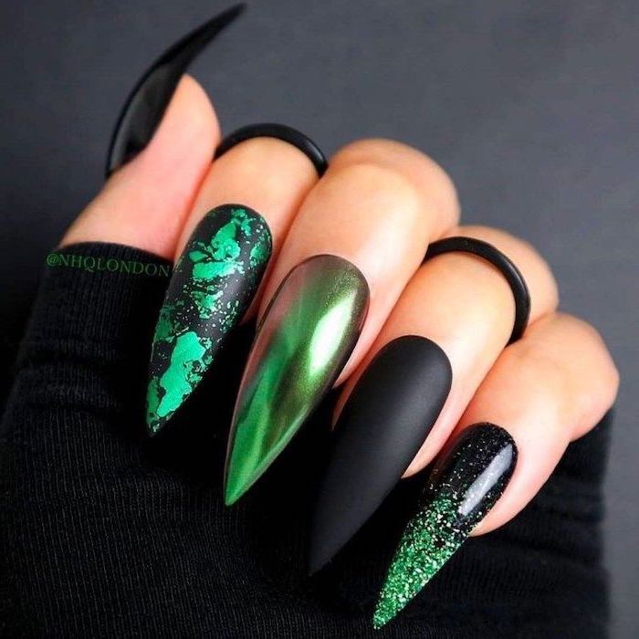 green chrome nails, black matte nails, green decorations, halloween nails, black rings, black background