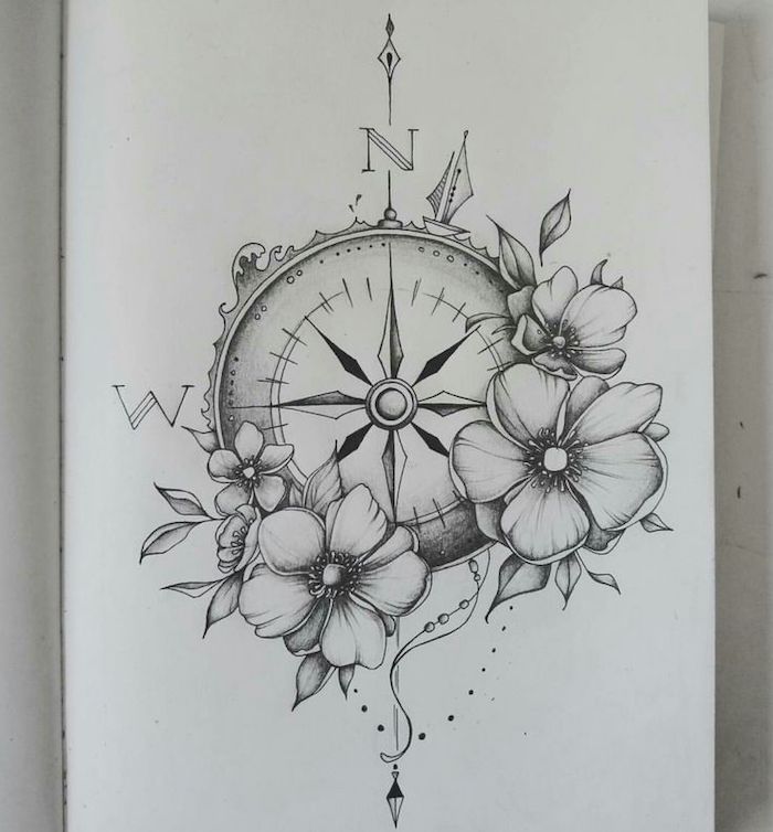 black and white drawing, nautical compass tattoo, surrounded by flowers, north and west