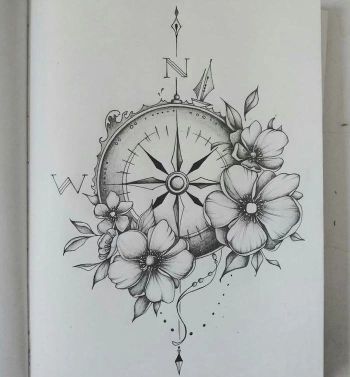 black and white drawing, nautical compass tattoo, surrounded by flowers, north and west