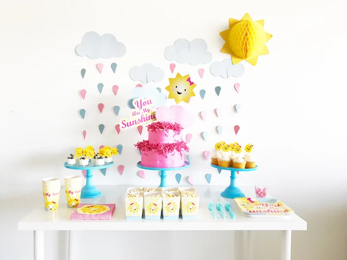 baby shower ideas for girls, you are my sunshine, blue cake stands, paper cup and plates, wooden table