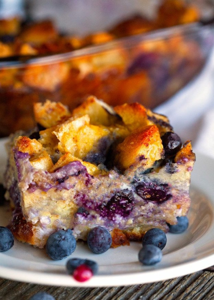 good breakfast ideas, baked pastry, with blueberries, white plate, wooden table