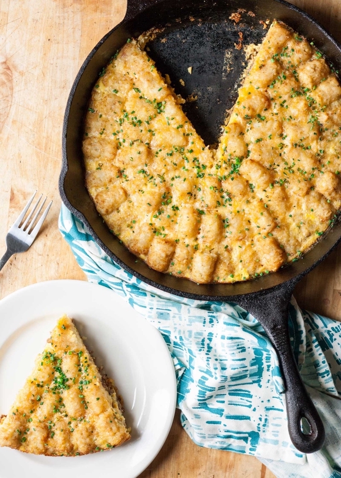 baked casserole, black pan, white plate, best breakfast recipes, wooden table