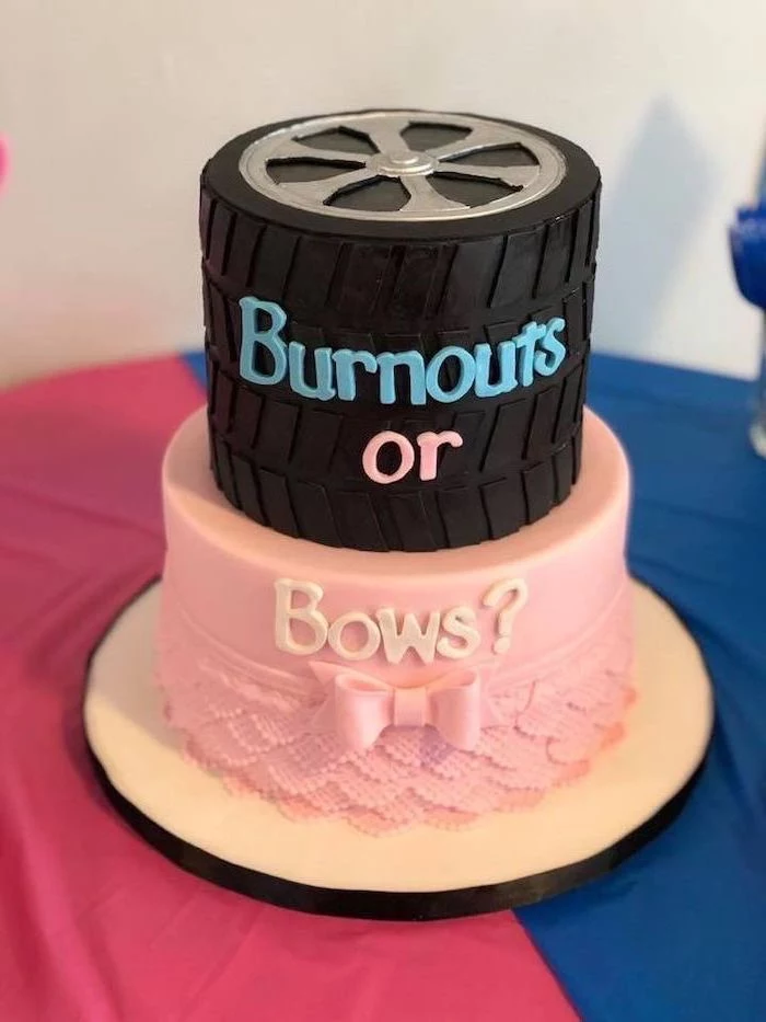 burnouts or bows, two tier cake, gender reveal games, pink and blue table cloth