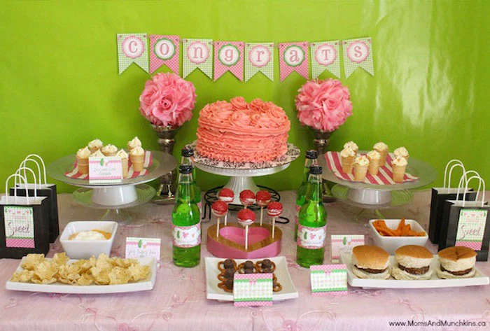 sweet and savoury table, green and pink decor, congrats garland, baby shower food ideas, burgers and pretzels