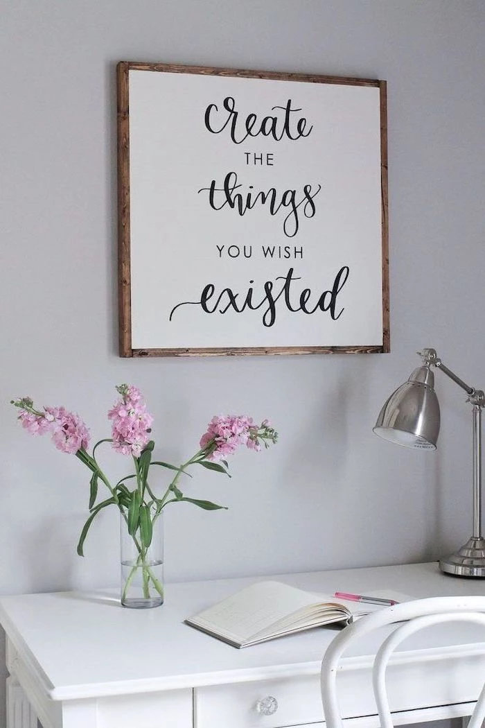 office decor ideas, create the things you wish existed, white desk, pink flower bouquet, open notebook