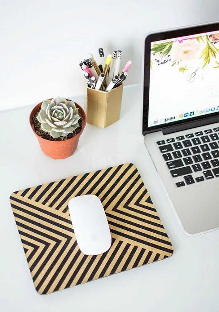 potted succulent, black and yellow, mouse pad, cubicle wallpaper, white desk, gold pencil holder