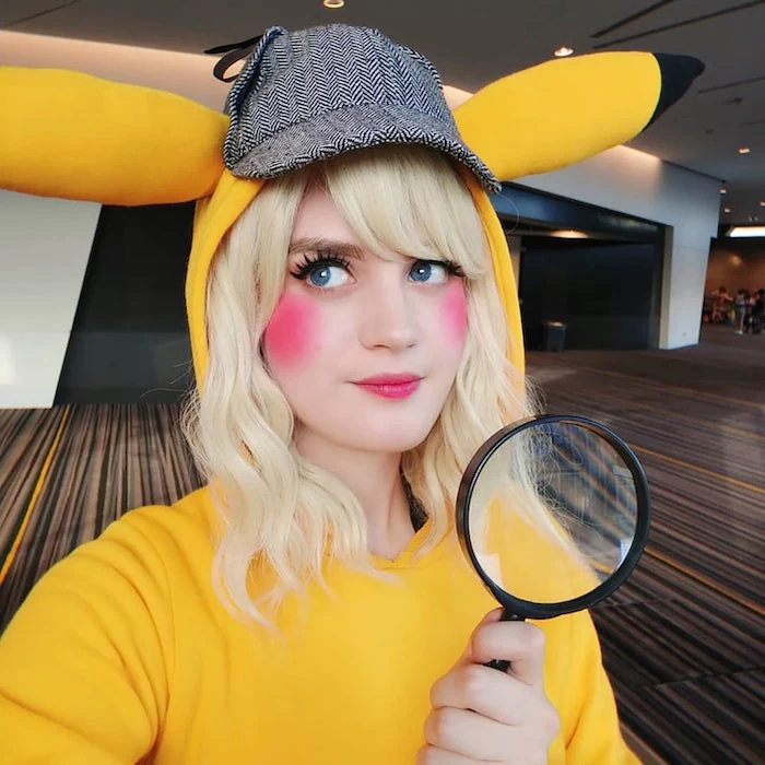 detective pikachu, halloween costumes, woman with blonde hair, holding a magnifying glass, rosy cheeks