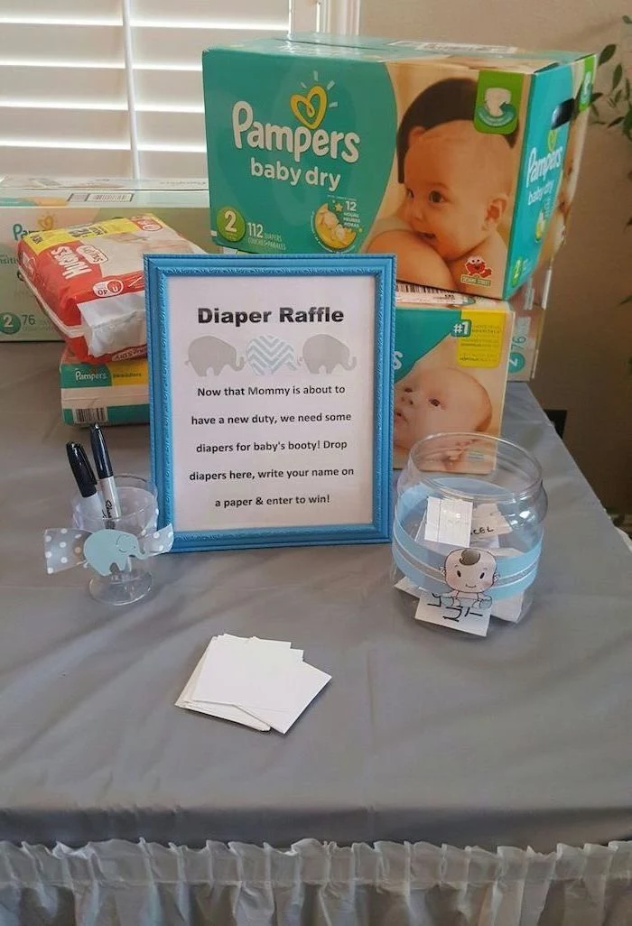 diaper raffle, blue frame, fun game, girl baby shower, pampers packet, glass jars