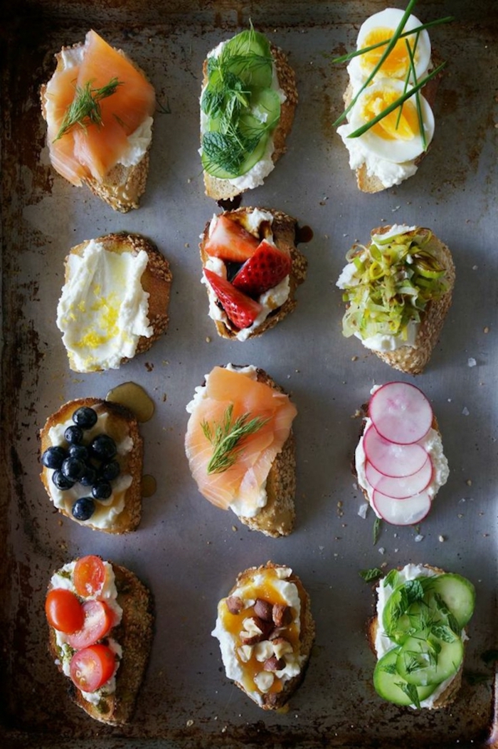 bruschetta toasts, brunch menu ideas, different garnish, salmon and chives, cherry tomatoes