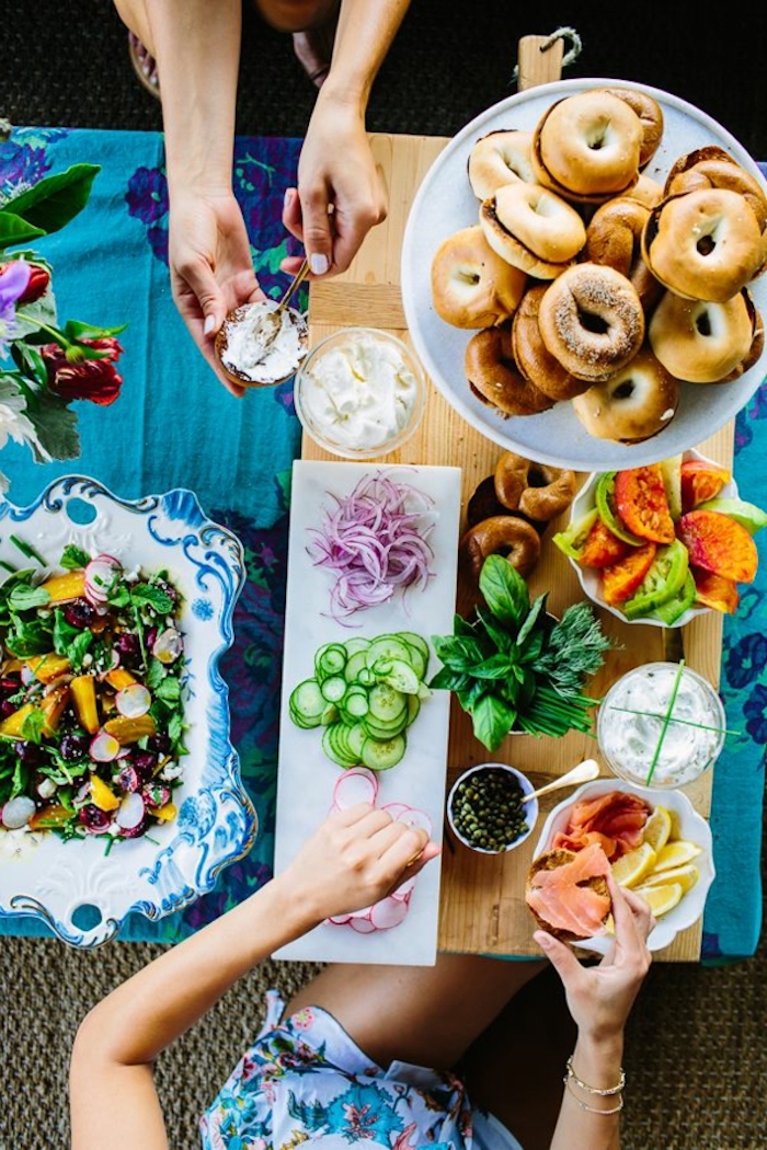 halved bagels, easy brunch recipes, chopped vegetables, green salad, sour cream