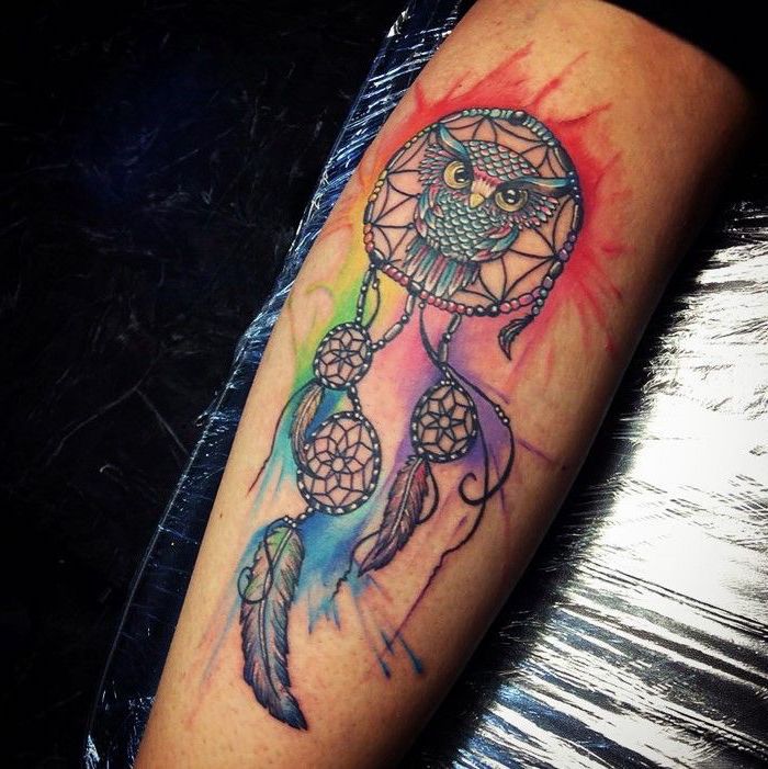 watercolor tattoo, back of leg tattoo, wolf dreamcatcher tattoo, owl inside the dreamcatcher